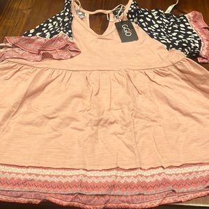 Blue top, pink, and black